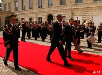 奥巴马和萨科奇在诺曼底登陆65周年纪念仪式上