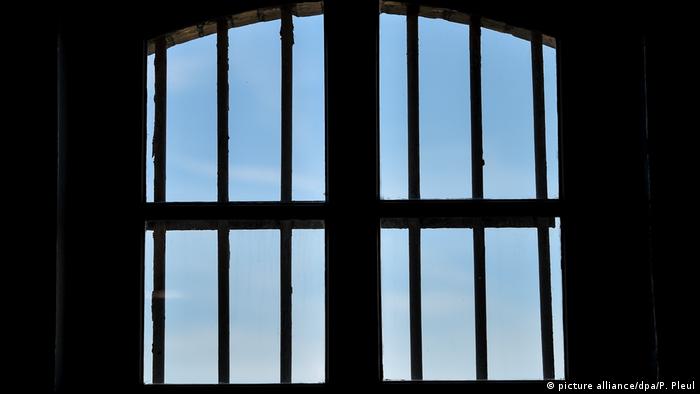 View though bars of a jail window 