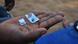 A man holds Tramadol tablets in his hand A man holds Tramadol tablets in his hand
