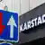 A Karstadt store and a street sign