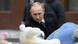 Vladimir Putin at a memorial to the victims of shopping center fire in western Siberia Vladimir Putin at a memorial to the victims of shopping center fire in western Siberia