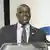 Photo of Botswana's vice president Mokgweetsi Masisi standing at a microphone