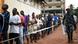 A long line of voters wait to cast their ballots in Sierra Leone. A long line of voters wait to cast their ballots in Sierra Leone.