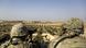 US soldiers look out towards the Turkish border from Manbij, Syria US soldiers look out towards the Turkish border from Manbij, Syria