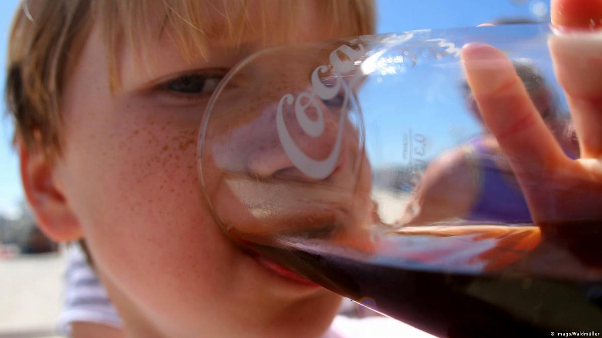 Kid drinking cola