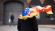 Man with Catalan flag on his back Man with Catalan flag on his back