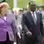 German Chancellor Angela Merkel welcomes Morgan Tsvangirai in Berlin with military honors
