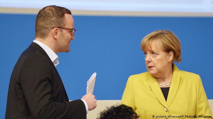 Bundeskanzlerin Merkel und Jens Spahn