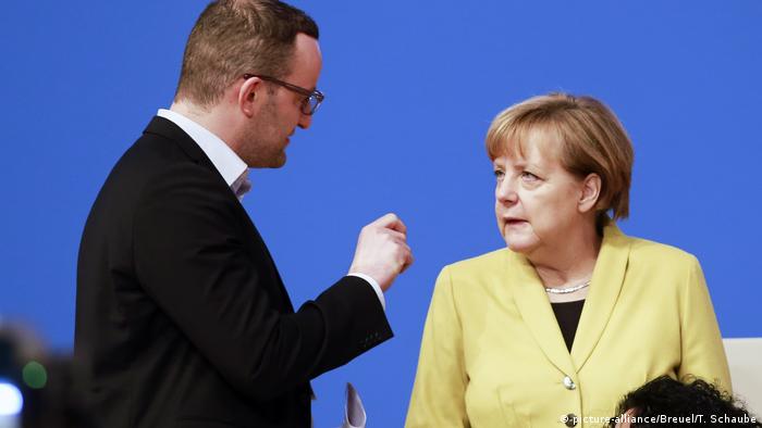 Bundeskanzlerin Merkel und Jens Spahn
