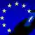 Логотип Facebook в смартфоне на фоне флага Евросоюза