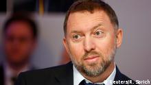 FILE PHOTO: Russian tycoon and President of RUSAL Oleg Deripaska listens during the Regions in Transformation: Eurasia event in Davos, Switzerland January 22, 2015. REUTERS/Ruben Sprich/File Photo