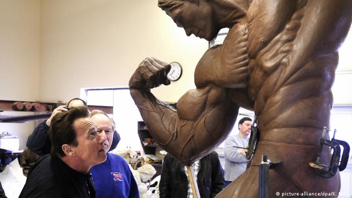 Arnold Schwarzenegger and his statue