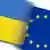 Eine ukrainische und eine europäische Flagge