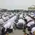 Muslims kneel during Eid al-Fitr prayers in Ghana