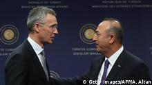 NATO Secretary-General Jens Stoltenberg (L) speaks with Turkish Foreign Minister Mevlut Cavusoglu after a press conference in Ankara, on April 16, 2018.
Turkey on April 16, 2018 hit back at French President Emmanuel Macron over his comments that the weekend's air strikes against the Syrian regime had driven a wedge between Ankara and its increasingly close ally Moscow. / AFP PHOTO / ADEM ALTAN (Photo credit should read ADEM ALTAN/AFP/Getty Images)