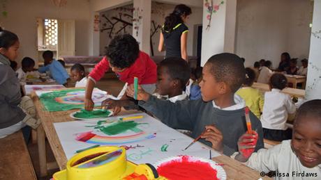 A group of children painting in class (Raissa Firdaws)