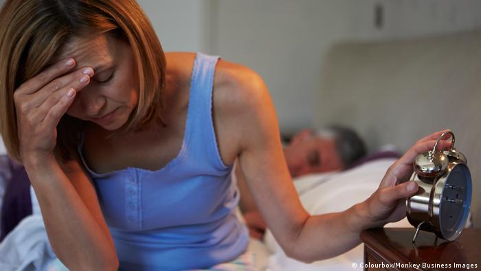 Woman Awake In Bed Suffering With Insomnia