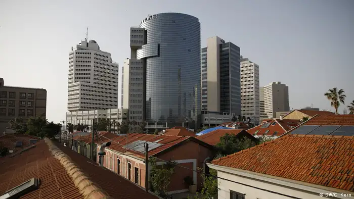 General view of Neve Tzedek with Tel Aviv's skyscrapers in the background
