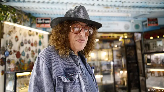 Zion Howav stands in front of a friend's jewellery shop on Shabazi Street in Neve Tzedek