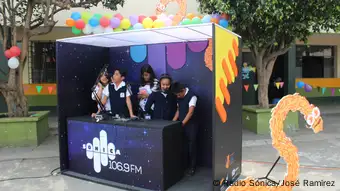 Broadcasts from a schoolyard: schoolchildren in La Limonada, a poor neighborhood of Guatemala City.