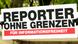 Плакат с надписью: "Репортеры без границ" - за защиту свободы информации! Плакат с надписью: "Репортеры без границ" - за защиту свободы информации!