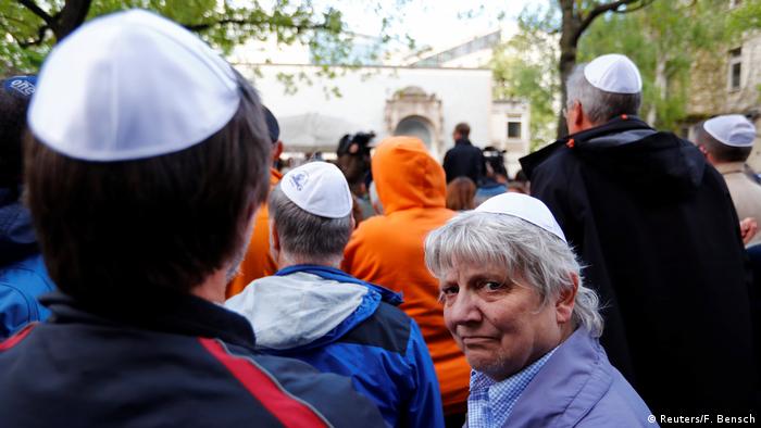 Berliners wear the kippa during a demonstration against anti-Semitism