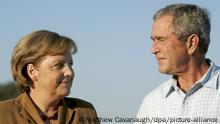 U.S. President George W. Bush (R) and German Chancellor Angela Merkel smile during their remarks following Merkel's arrival at the Bush's ranch in Crawford Texas USA on 09 November 2007. Merkel and Bush are expected to discuss the situation in Iran during her visit. EPA/MATTHEW CAVANAUGH +++(c) dpa - Report+++ |