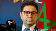 Nasser Bourita the Moroccan Minister of Foreign Affairs looks on as he speaks to the press after meeting with the United Nations special envoy for Libya on December 8, 2017, in Rabat. / AFP PHOTO / FADEL SENNA (Photo credit should read FADEL SENNA/AFP/Getty Images)