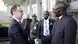 Deputy Chairman of the African Union Thomas Kwesi and German Foreign Minister Heiko Maas shake hands