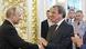 Former German Chancellor Gerhard Schröder shakes hands with Russian President Vladimir Putin at his inauguration Former German Chancellor Gerhard Schröder shakes hands with Russian President Vladimir Putin at his inauguration