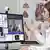 Symbolfoto zur Telemedizin Ärztin in einer Praxis kommuniziert mit dem Patienten über eine Webcam