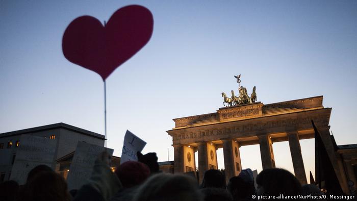 A cutout heart sign during a rally at the Brandenburg Gate in Berlin