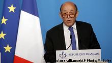 French Minister for Foreign Affairs Jean-Yves Le Drian gives an official statement in the press room after attending an emergency meeting with French President Emmanuel Macron at the Elysee Palace, in Paris, France, Saturday, April 14, 2018. The United States, France and Britain have launched military strikes in Syria to punish President Bashar Assad for an apparent chemical attack against civilians and to deter him from doing it again. (AP Photo/Michel Euler, Pool) |