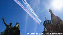 09.05.2018+++ Russian Su-25 assault aircrafts release smoke in the colours of the Russian flag while flying over Red Square during the Victory Day military parade in Moscow on May 9, 2018. - Russia marks the 73rd anniversary of the Soviet Union's victory over Nazi Germany in World War Two. (Photo by Kirill KUDRYAVTSEV / AFP) (Photo credit should read KIRILL KUDRYAVTSEV/AFP/Getty Images)