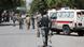 fghan security personnel inspect at the site of a suicide attack, fghan security personnel inspect at the site of a suicide attack,
