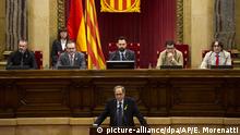 Separatist lawmaker Quim Torra, candidate for regional president, speaks during a parliamentary session in Barcelona, Spain, Saturday, May 12, 2018. The Catalan parliament said Friday that Torra is set to be put forward for election in a vote Saturday. Separatist parties in Catalonia aim to elect one of their own as regional president by early next week, ending five months of political deadlock amid the restive region's attempts to secede from Spain. (AP Photo/Emilio Morenatti) |