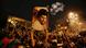 Supporters hold a banner with the picture of Muqtada al-Sadr in a spontaneous rally after preliminary results were anounce Supporters hold a banner with the picture of Muqtada al-Sadr in a spontaneous rally after preliminary results were anounce