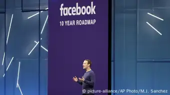 Mark Zuckerberg holding a speech at a facebook corporate event