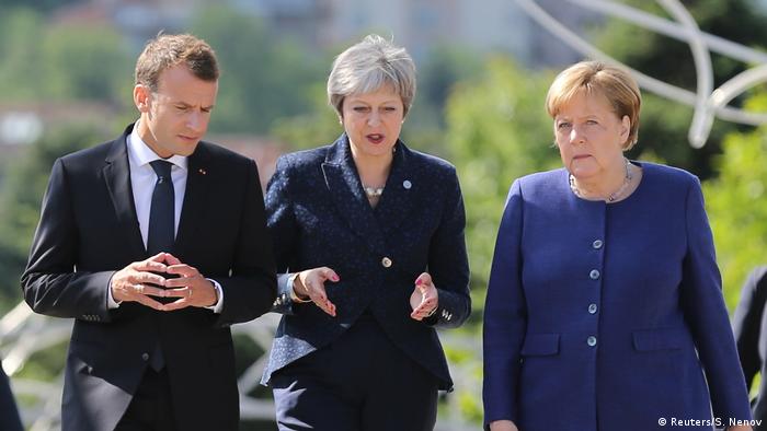 Angela Merkel, Theresa May y Emmanuel Macron