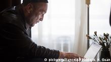 In this March 30, 2018, photo, Omir Bekali looks at a computer to trace the location of the Chinese internment camp he was held during an interview in Almaty, Kazakhstan. Since 2016, Since 2016, Chinese authorities in the heavily Muslim region of Xinjiang have ensnared tens, possibly hundreds of thousands of Muslim Chinese, and even foreign citizens, in mass internment camps. The program aims to rewire detainees’ thinking and reshape their identities. Chinese officials say ideological changes are needed to fight Islamic extremism. (AP Photo/Ng Han Guan) |