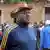 Photo of Pierre Nkurunziza wearing a cowboy hat and a tracksuit top