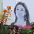 Цветы у портрета Дафне Каруане Галиции
