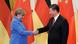 China's President Xi Jinping (R) meets German Chancellor Angela Merkel China's President Xi Jinping (R) meets German Chancellor Angela Merkel