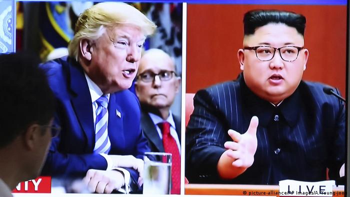 Südkorea TV Bildschirm Donald Trump, Kim Jong Un (picture-alliance/AP Images/A. Young-joon)