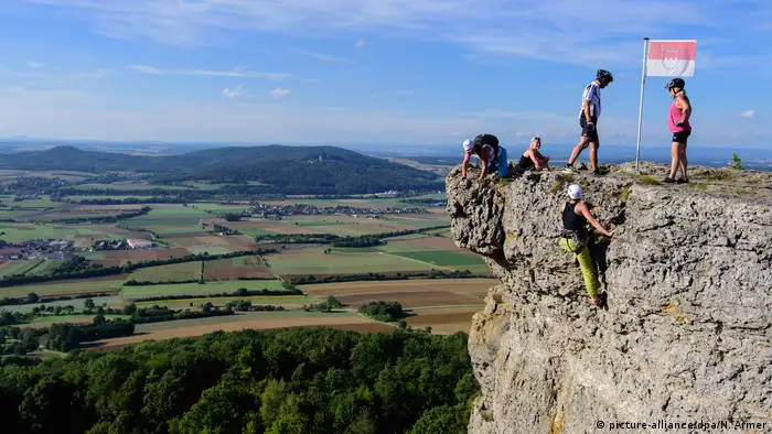 People on the high plateau of the Staffelberg Mountain looking out at the surrounding countryside