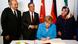 Angela Merkel signs a memorial book at the conmemoration of the Solingen attacks in Düsseldorf Angela Merkel signs a memorial book at the conmemoration of the Solingen attacks in Düsseldorf
