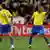 Brazil's Maicon, right, celebrates with his teammate Lucio