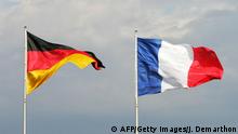 Berlin, GERMANY: Germany's, France's and the EU flag wave in the courtyard of the chancellory in Berlin, le 16 mai 2007, during the visit of the new French President Nicolas Sarkozy to German Chancellor Angela Merkel. It was Sarkozy's first trip abroad as President, after taking office earlier in the day. AFP PHOTO JACQUES DEMARTHON (Photo credit should read JACQUES DEMARTHON/AFP/Getty Images)