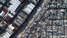 Aerial image of Cape Town contrasting a township against a business park