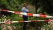 A police officer secures the crime scene where a 15-year-old was stabbed in Viersen, Germany A police officer secures the crime scene where a 15-year-old was stabbed in Viersen, Germany